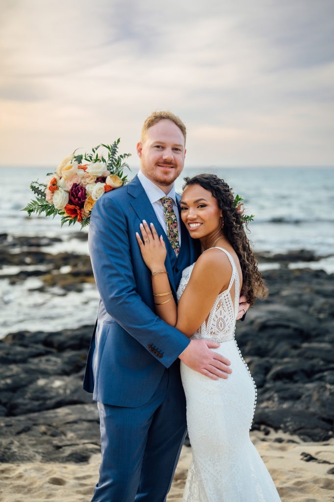 sunset elopement in Hawaii with stunning couple