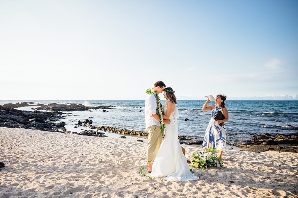 Wedding ceremony on the beach during elopement in Hawaii
