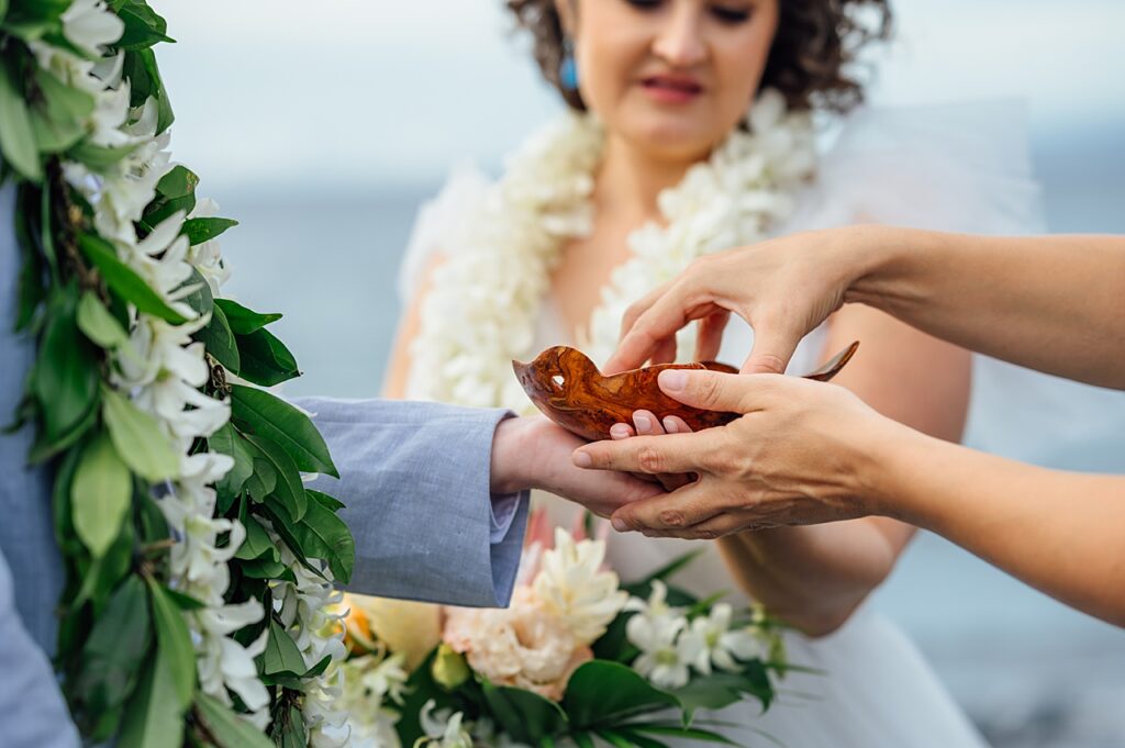 blessing the ring during hawaii ceremony