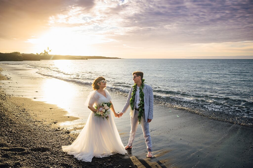 newlyweds with fun sunglasses